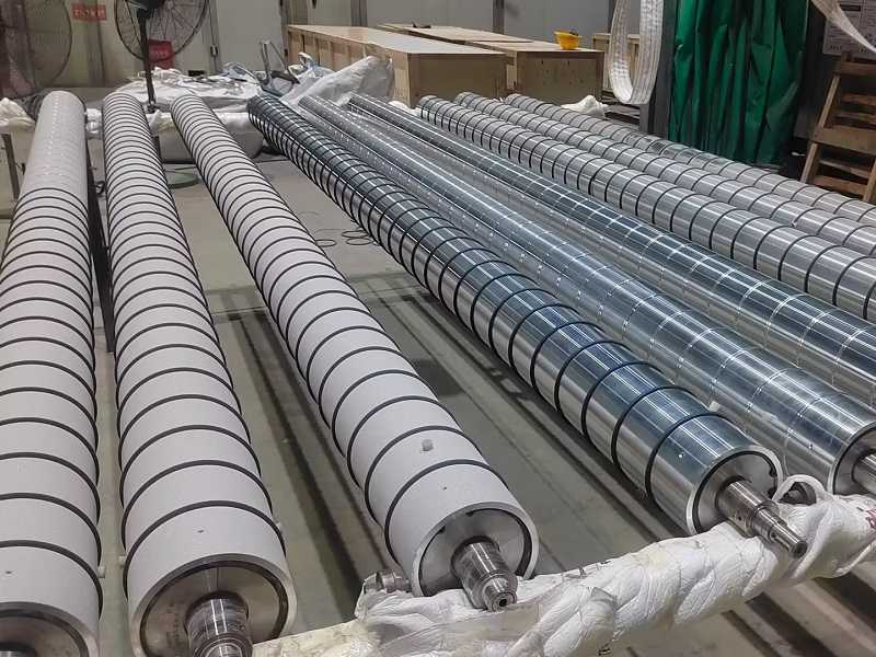 长青金属热喷涂公司对托辊喷砂表面强化